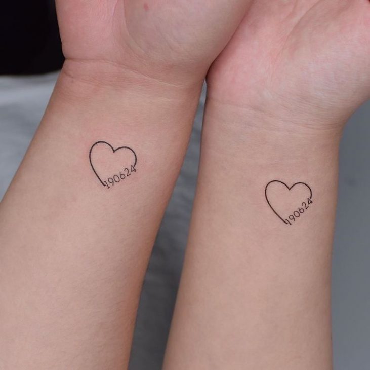 tatuagem-para-casal-com-coracao-e-data-do-compromisso