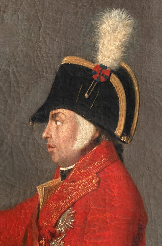 O Rei D. João VI, ostentando o laço azul-escarlate de Portugal no seu bicorno